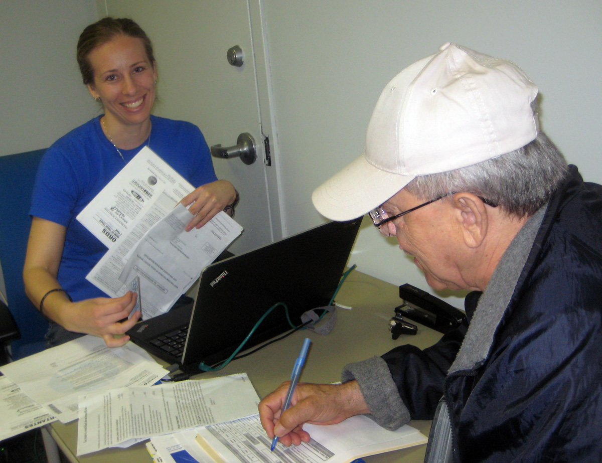 UNHP providing free tax prep at a local Citibank branch.