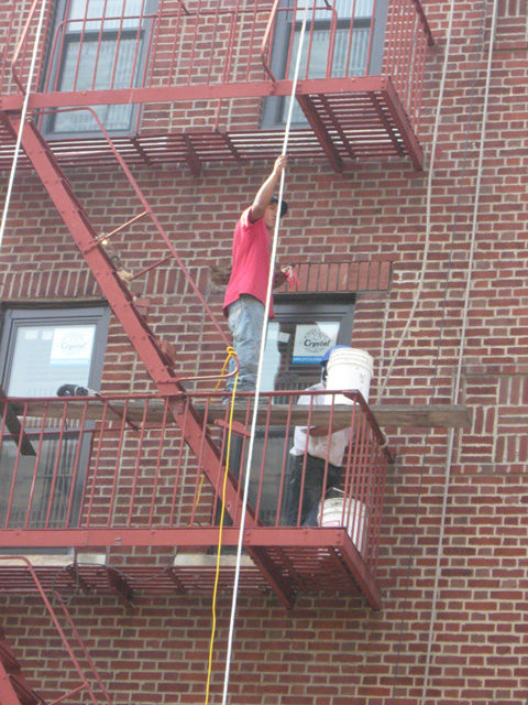 Weatherization work is performed on the 308 E 183 Street.